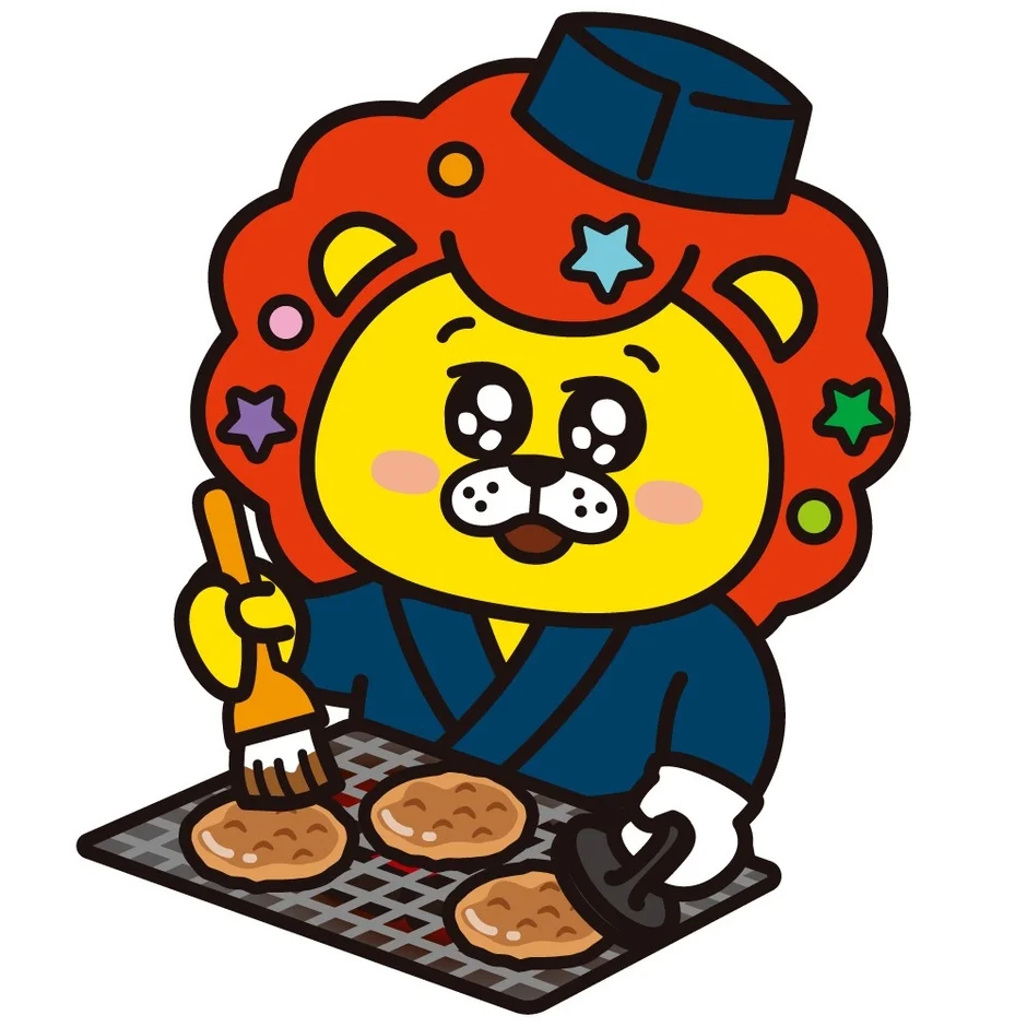 青い帽子と制服を着たライオンのキャラクターがグリルでお好み焼きを焼いているイラスト