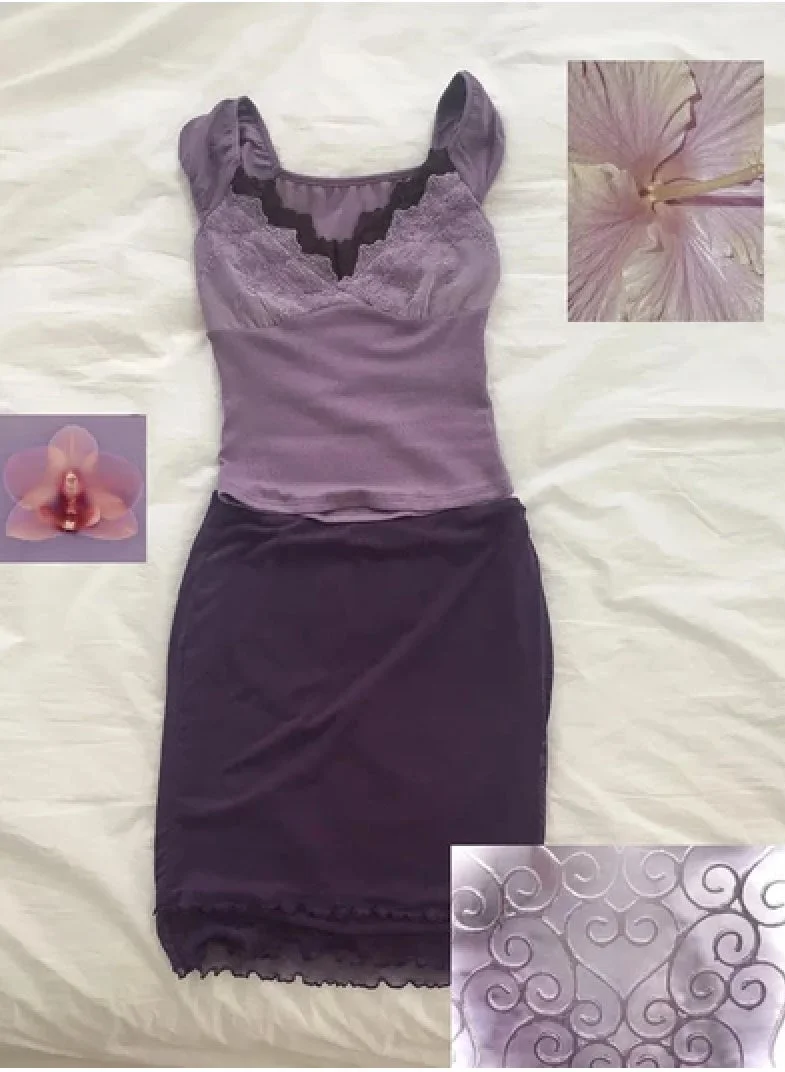 ラベンダー色のレーストップスと濃い紫色のスカートが平置きされ、蘭の花や渦巻くハートの模様がコラージュされたファッションアイテム